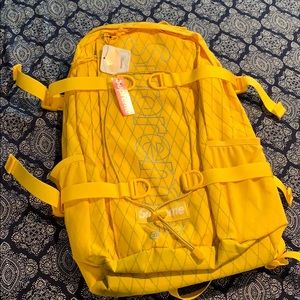 Yellow supreme logo backpack